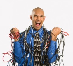 African American businessman wrapped in computer cables screaming. 4d